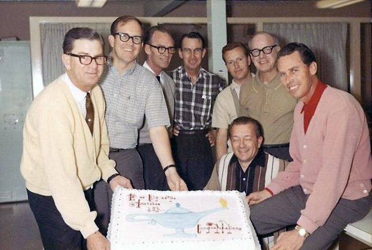 Shown clockwise are Hand Schutte, Bob Gilbert (not designers), Jack Larson Sr., Hermon Boernge, Brian Leming, Kermit Wayne, Ray Larson and Ben Mitchem (kneeling). Photograph courtesy of Brian Leming & YESCO